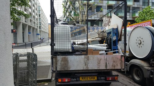 Professional garage clearance team at work